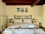 A house between a waterfall and a lake the enchantment of Nesso