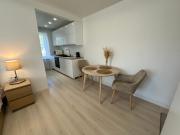Apartamentai šalia baseino