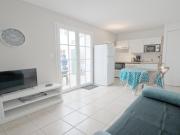 Appartement fonctionnel intra-muros avec cour et garage sécurisé - FR-1-835-1