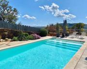 VILLA CARAMONTINU SERENA à Pinarello, proche plage, vue mer, piscine chauffée