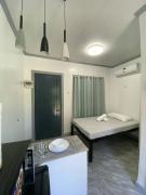 8-Door Room Apartment with Kitchenette and Air-Conditioned Individual Room