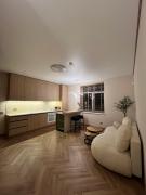 Apartamentai pirmame aukšte, miesto centre