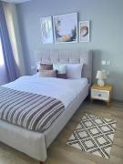 classy executive two bedroom apartment with fully equipped gym ample parking space heated swimming pool children playing ground and amazing breathtaking city views which offers luxury and comfort