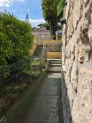 T2 rez de jardin de villa au calme