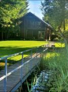 Atostogų namelis ant ežero kranto