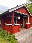 Husarstuga, house at riverside near many lakes