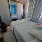 Apartamento completo com Wi-Fi, garagem em condomínio - Ideal para estadias tranquilas