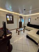 Kitnet Perto de Tudo-Varanda-Garagem