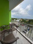 Sheryll Escapes - La Grande Phase 2, Grand Studio 524 with Balcony, Wifi & Netflix