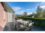 Family house on a small park with a large playing field