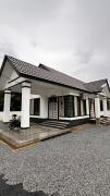 Top Tanah Merah