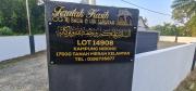 Top Tanah Merah
