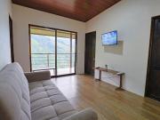 VILLA SANTA LUCÍA in front of the waterfall with a mountain view