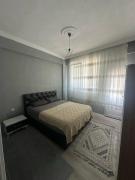 In the center, 6-7 minutes to the airport, close to the sea and coves