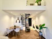 Das Alpenzeit Loft mit Balkon und Grimmingblick