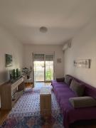 Cozy Apartment with Private Garage - Walk to City Center