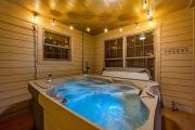 Luxury Cabin w Hot Tub Games Views await