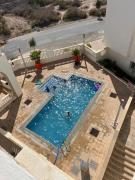 Appartement vue sur mer avec piscine