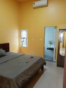 A two-bedroom home with natural light and green environment