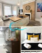 The Bournemouth Haven - Brought to you by Coastline Retreats - Grand 2 bedroom luxury apartment - 3 mins walk to beach - Superfast Wifi - Sleeps 6
