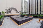 Moderno Aconchegante Studio com Rooftop e coworking
