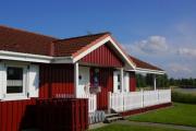 4 Personen Ferienhaus mit Kaminofen, Wintergarten und Kanu, mit einem wundervollen Blick auf den See in Otterndorf