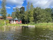 Sommarstuga med sjötomt och brygga