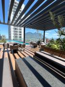 Elegante loft apartment Paseo Santa Lucia king size bed, alberca, gym, parking, kids club