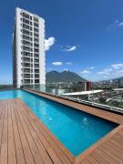 Elegante loft apartment Paseo Santa Lucia king size bed, alberca, gym, parking, kids club