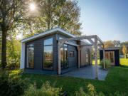 Holiday home surrounded by water and forest