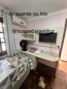 Quarto Deluxe em Foz piscina wifi estacionamento cozinha E AR