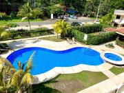 Cozy Condo with Panoramic Hillside Views from Rooftop Terrace and Short Walk to Beach