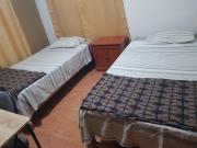 Habitación con doble cama privada en Talara centro