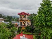 Riva Dreams 2-BHK Retreat with Hill Views & Lush Garden