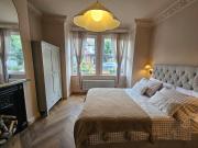 Cosy Garden Flat in Wimbledon