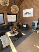 Flott nyere hytte i Sirdal med fantastisk utsikt og solforhold