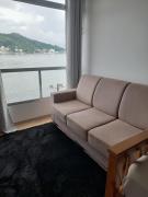 Apt pé na areia vista mar