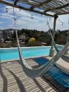 Estudio Nuevo a 7 min de playa, GYM, 2 albercas, Coworking, cerca de Plaza Central