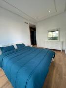 Appartement Luxe Vue Piscine Résidence Les Perles de Bentriaa, El Mansouria