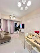 Spacious and Aesthetic 2 Bedroom with City-View Balcony at Grass Residences QC