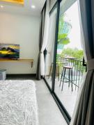 305MSNK Luxe Twin Studio I Balcony & Kitchen