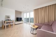 Pastel Apartment with Balcony and Parking by Noclegi Renters