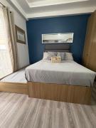 Amani 311 Suites - Double bed with Single Pull Out Bed