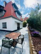 Charming holiday home with terras near the beach Charming holiday home with terras near the beach