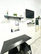 Linda Kitinete frente a praia