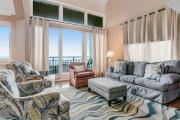 Ocean-view 4th-floor condo with balcony, outdoor pool & central AC