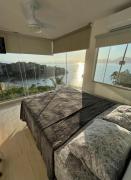 Casa em Angra com 4 quartos, churrasqueira, piscina, sinuca e quadra privativa