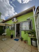 Casa de praia com ar condicionado.