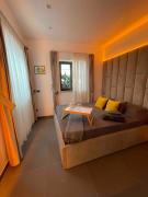 JOIVY Exclusive 2-Bedroom Villa with Private Garden - 5 minutes from the Colosseum JOIVY Exclusive 2-Bedroom Villa with Private Garden - 5 minutes from the Colosseum