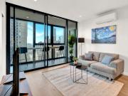 Prime CBD Location - Modern Melbourne Apartment with Enclosed Balcony Free Tram Access